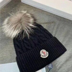 Moncler Black Beanie with Brown Pom Pom